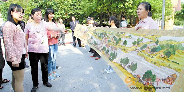 梁山街道：市民兩年繡出6米長(zhǎng)《清明上河圖》十字繡